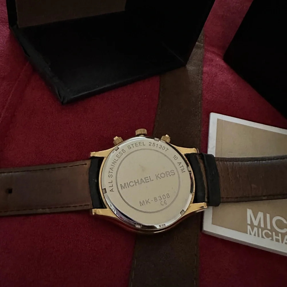 Michael Kors Women's Black Leather Strap Gold-Tone Dial Watch